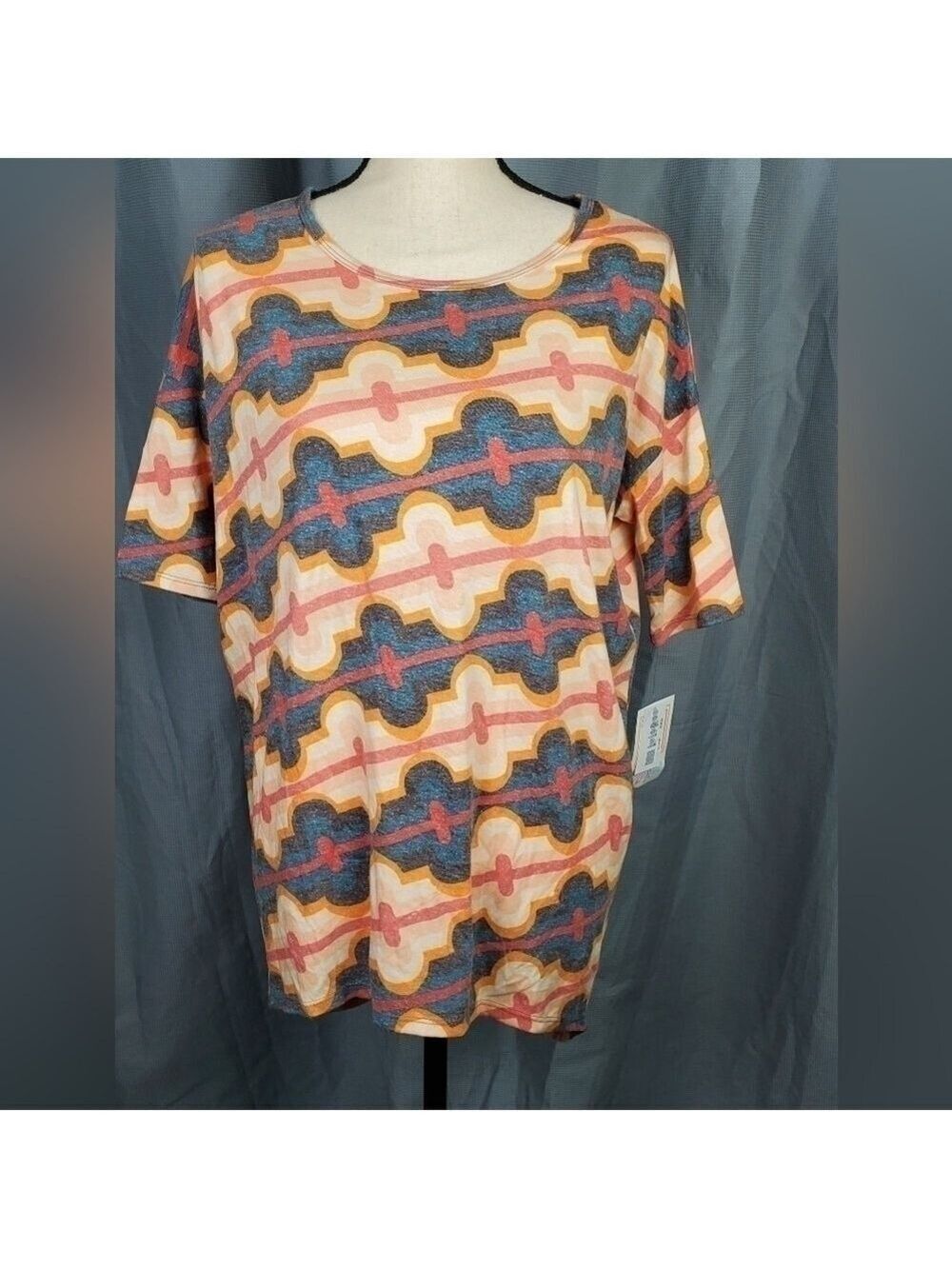 NWT Lularoe Irma, multicolored linear geometric pattern, size XXS
